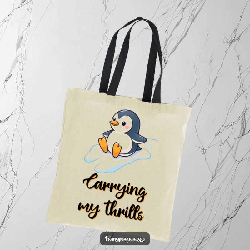 Funny tote bag with a penguin sliding down a hill, perfect for carrying groceries or beach essentials with a wintery theme.